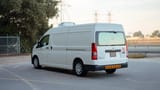 Used 2020 Toyota Hiace GLX High Roof in White – Left Back Diagonal (45°) View for Sale at First Choice Cars Dubai Sharjah