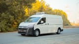 Used 2020 Toyota Hiace GLX High Roof in White – Left Front Diagonal (45°) View for Sale at First Choice Cars Dubai Sharjah