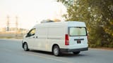 Used 2020 Toyota Hiace GLX High Roof in White – Left Back Diagonal (45°) View for Sale at First Choice Cars Dubai Sharjah