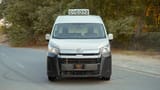Used 2020 Toyota Hiace GLX High Roof in White – Front View for Sale at First Choice Cars Dubai Sharjah