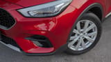 Used 2024 MG ZS Comfort in Red – Headlight Close-up for Sale at First Choice Cars Dubai Sharjah