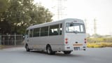 Used 2023 Mitsubishi Rosa Standard in White – Left Back Diagonal (45°) View for Sale at First Choice Cars Dubai Sharjah