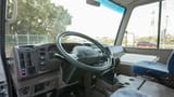 Used 2023 Mitsubishi Rosa Standard in White – Driver Side Dashboard & Steering View for Sale at First Choice Cars Dubai Sharjah