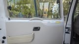 Used 2023 Mitsubishi Rosa Standard in White – Driver Door Panel Full View for Sale at First Choice Cars Dubai Sharjah