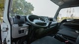 Used 2022 Mitsubishi Canter Chiller Box in White – Driver Side Dashboard & Steering View for Sale at First Choice Cars Dubai Sharjah