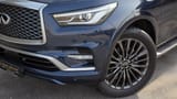 Used 2024 Infiniti QX80 Luxury in Blue – Headlight Close-up for Sale at First Choice Cars Dubai Sharjah