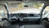 Used 2024 Mitsubishi Canter Double Cabin Cargo Body in White – Front Cabin / Dashboard Full View for Sale at First Choice Cars Dubai Sharjah