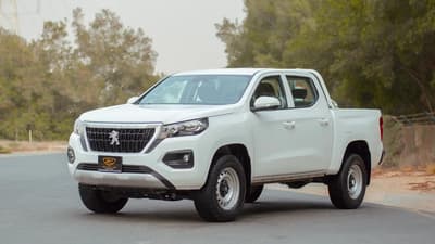 Used 2023 Peugeot Landtrek Double Cabin White – Left Front Diagonal (45°) View at First Choice Cars Sharjah