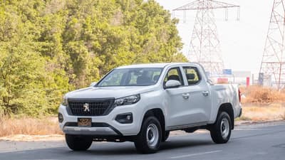 Used 2023 Peugeot Landtrek Double Cabin White – Left Front Diagonal (45°) View at First Choice Cars Sharjah