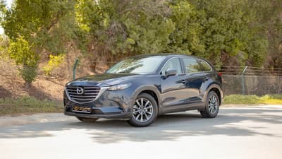 Used 2023 Mazda CX-9 GT in Blue – Left Front Diagonal (45°) View for Sale at First Choice Cars Dubai Sharjah
