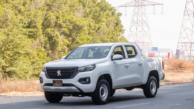Used 2023 Peugeot Landtrek Double Cabin White – Left Front Diagonal (45°) View at First Choice Cars Sharjah