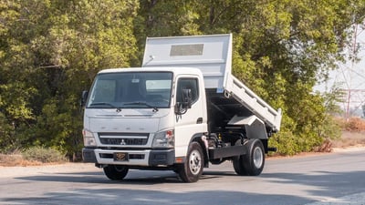 Used 2024 Mitsubishi Canter Tipper White – Left Front Diagonal (45°) View at First Choice Cars Sharjah