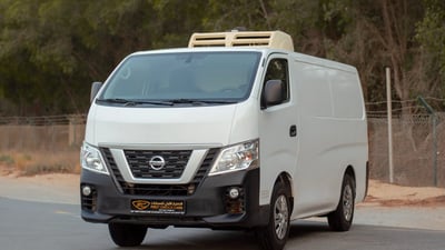 Used 2021 Nissan Urvan Standard Roof White – Left Front Diagonal (45°) View at First Choice Cars Sharjah