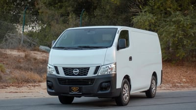 Used 2016 Nissan Urvan Standard Roof White – Left Front Diagonal (45°) View at First Choice Cars Sharjah