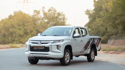 Used 2020 Mitsubishi L200 GLX Double Cabin White – Left Front Diagonal (45°) View at First Choice Cars Sharjah