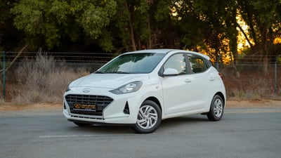 Used 2023 Hyundai Grand i10 Smart White – Left Front Diagonal (45°) View at First Choice Cars Sharjah