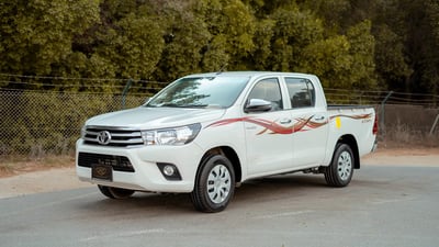 Used 2022 Toyota Hilux GLX Double Cabin White – Left Front Diagonal (45°) View at First Choice Cars Sharjah