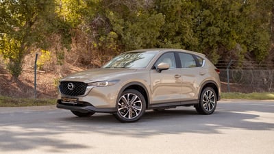 Used 2023 Mazda CX-5 GT Gold – Left Front Diagonal (45°) View at First Choice Cars Sharjah