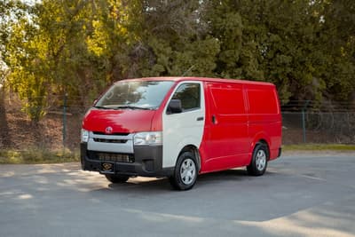 Used 2020 Toyota Hiace GL High Roof Red – Left Front Diagonal (45°) View at First Choice Cars Sharjah