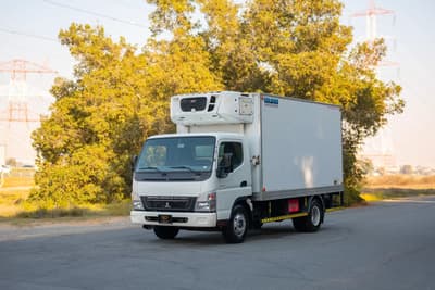 Used 2016 Mitsubishi Canter Freezer Box in White – Left Front Diagonal (45°) View for Sale at First Choice Cars Dubai Sharjah