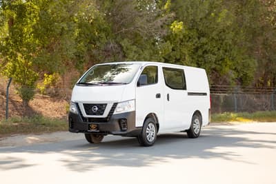 Used 2022 Nissan Urvan Standard Roof in White – Left Front Diagonal (45°) View for Sale at First Choice Cars Dubai Sharjah
