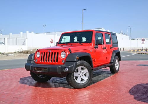 Used 2016 Jeep Wrangler Unlimited Sport Red – Left Front Diagonal (45°) View at First Choice Cars Sharjah