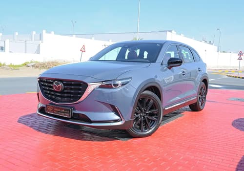 Used 2022 Mazda CX-9 Ignite Edition Blue – Left Front Diagonal (45°) View at First Choice Cars Sharjah