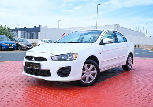 Used 2017 Mitsubishi Lancer Ex GLX White – Left Front Diagonal (45°) View at First Choice Cars Sharjah