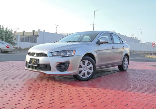 Used 2017 Mitsubishi Lancer Ex GLS White – Left Front Diagonal (45°) View at First Choice Cars Sharjah