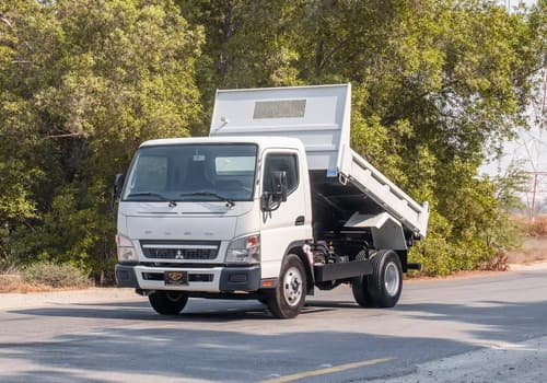 Used 2024 Mitsubishi Canter Tipper White – Left Front Diagonal (45°) View at First Choice Cars Sharjah