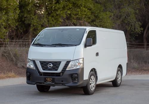 Used 2021 Nissan Urvan Standard Roof in White – Left Front Diagonal (45°) View for Sale at First Choice Cars Dubai Sharjah