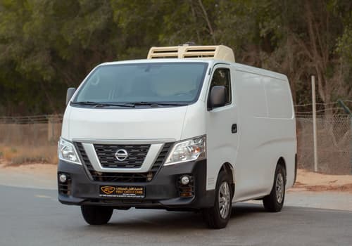 Used 2021 Nissan Urvan Standard Roof White – Left Front Diagonal (45°) View at First Choice Cars Sharjah