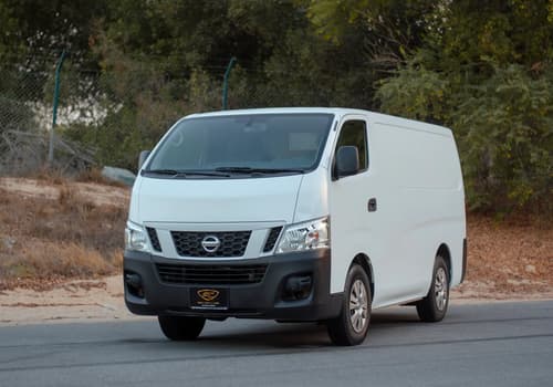 Used 2016 Nissan Urvan Standard Roof in White – Left Front Diagonal (45°) View for Sale at First Choice Cars Dubai Sharjah