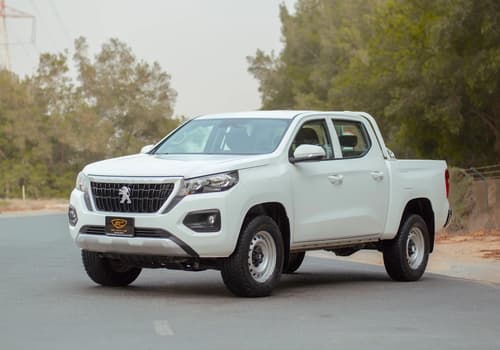 Used 2023 Peugeot Landtrek Double Cabin in White – Left Front Diagonal (45°) View for Sale at First Choice Cars Dubai Sharjah