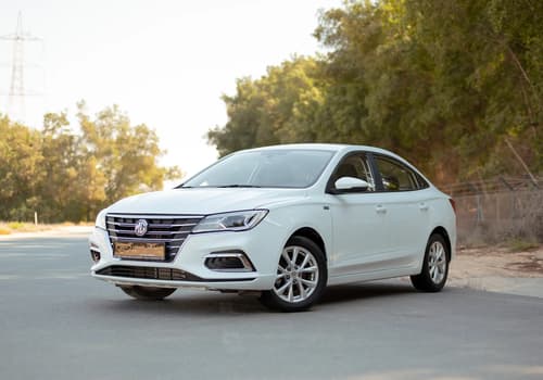 Used 2022 MG 5 Comfort White – Left Front Diagonal (45°) View at First Choice Cars Sharjah