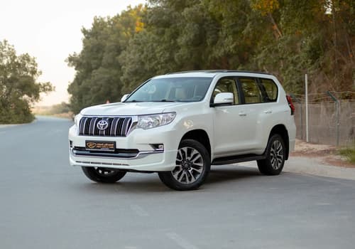 Used 2022 Toyota Prado GXR White – Left Front Diagonal (45°) View at First Choice Cars Sharjah