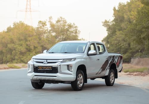 Used 2020 Mitsubishi L200 GLX Double Cabin in White – Left Front Diagonal (45°) View for Sale at First Choice Cars Dubai Sharjah