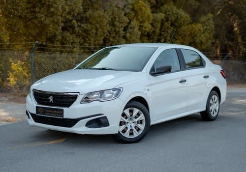 Used 2021 Peugeot 301 Allure White – Left Front Diagonal (45°) View at First Choice Cars Sharjah