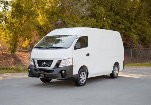 Used 2022 Nissan Urvan High Roof White – Left Front Diagonal (45°) View at First Choice Cars Sharjah