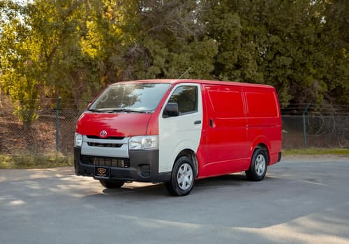 Used 2020 Toyota Hiace GL High Roof Red – Left Front Diagonal (45°) View at First Choice Cars Sharjah
