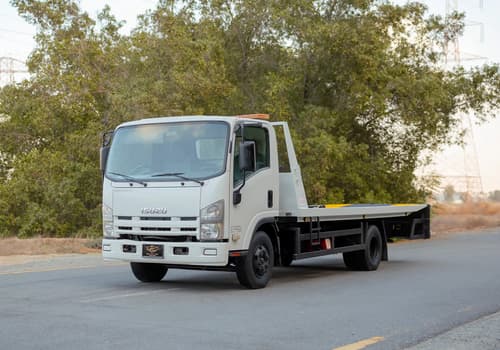 Used 2017 Isuzu NPR Recovery White – Left Front Diagonal (45°) View at First Choice Cars Sharjah