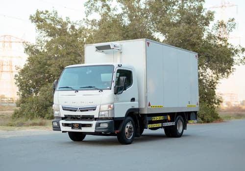 Used 2020 Mitsubishi Canter Chiller Box in White – Left Front Diagonal (45°) View for Sale at First Choice Cars Dubai Sharjah