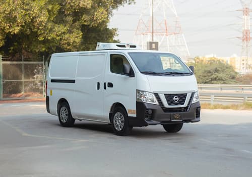Used 2021 Nissan Urvan Standard Roof in White – Left Front Diagonal (45°) View for Sale at First Choice Cars Dubai Sharjah