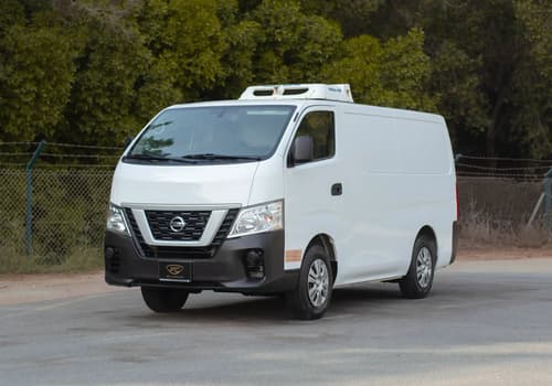 Used 2021 Nissan Urvan Standard Roof in White – Left Front Diagonal (45°) View for Sale at First Choice Cars Dubai Sharjah