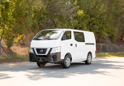 Used 2022 Nissan Urvan Standard Roof in White – Left Front Diagonal (45°) View for Sale at First Choice Cars Dubai Sharjah