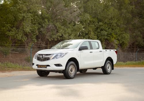 Used 2020 Mazda BT-50 XS in White – Left Front Diagonal (45°) View for Sale at First Choice Cars Dubai Sharjah