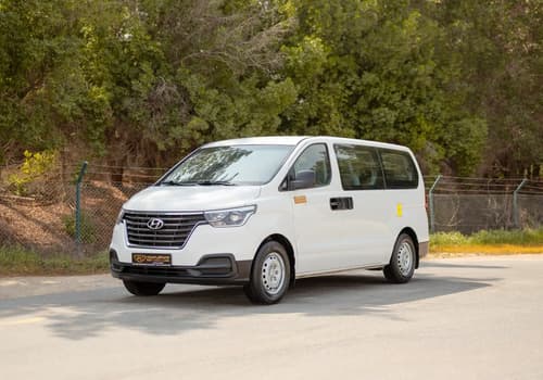 Used 2021 Hyundai H1 12-Seater Wagon in White – Left Front Diagonal (45°) View for Sale at First Choice Cars Dubai Sharjah