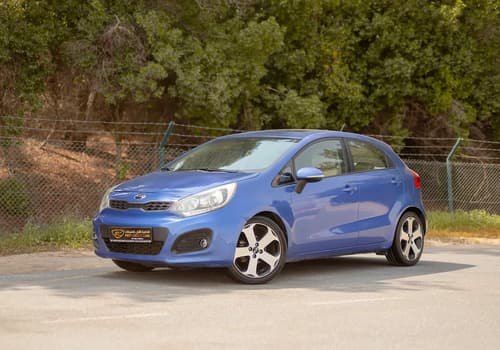 Used 2015 Kia Rio EX in Blue – Left Front Diagonal (45°) View for Sale at First Choice Cars Dubai Sharjah