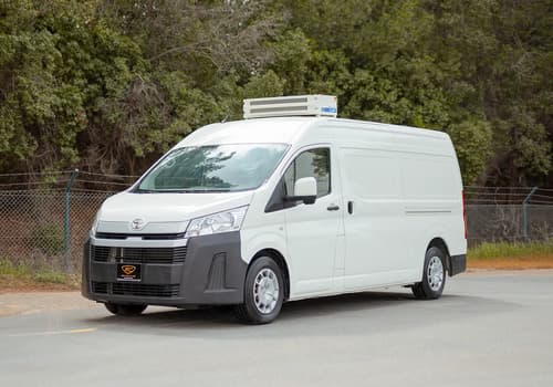 Used 2020 Toyota Hiace GLX High Roof in White – Left Front Diagonal (45°) View for Sale at First Choice Cars Dubai Sharjah