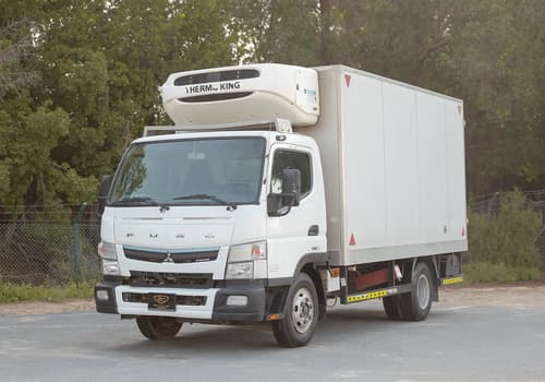 Used 2020 Mitsubishi Canter Chiller Box in White – Left Front Diagonal (45°) View for Sale at First Choice Cars Dubai Sharjah